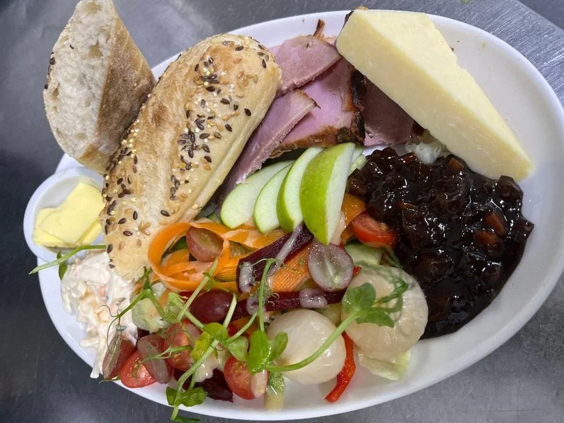 Ploughman's platter with cheeses, bread and pickles