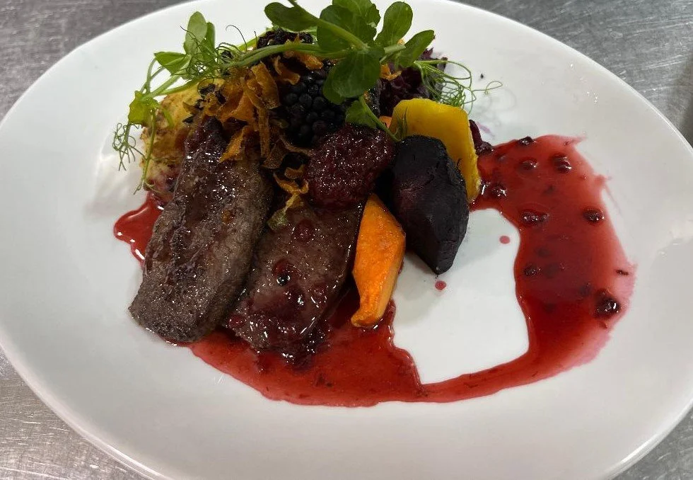 Venison dish plated at The Woodmancote